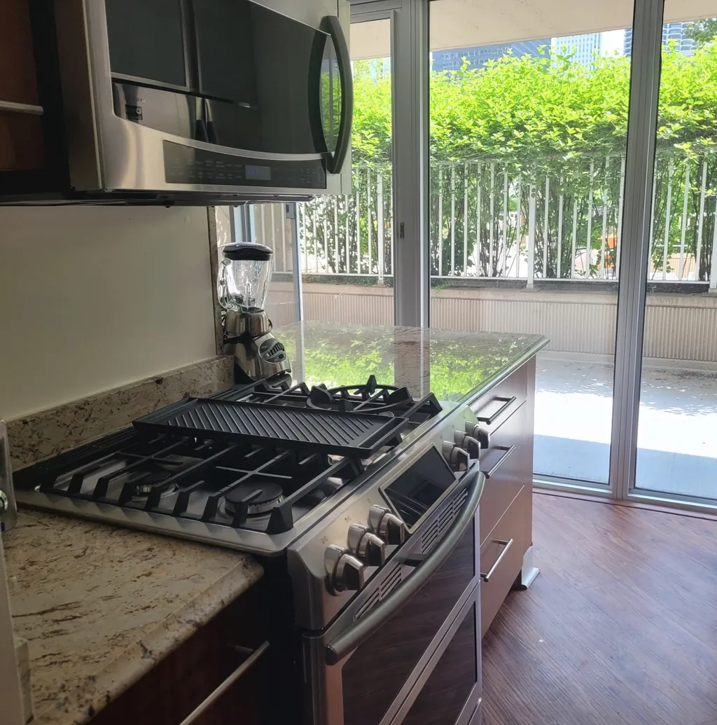Unit W907 — Cabinet + granite work (custom kitchen)